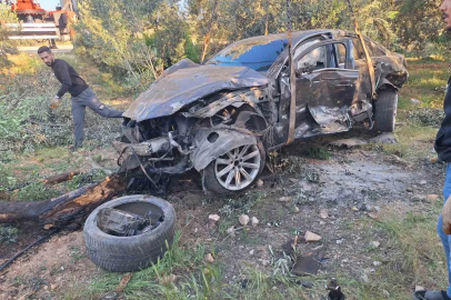 Hurdaya dönen araçtan yaralı kurtuldu
