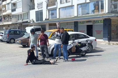 Bisikletli çocuğa çarpmamak için motosikletini devirip yaralandı
