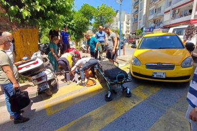 Efeler’de yolun karşısına geçmek isteyen kadına taksi çarptı: 1 yaralı
