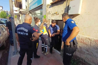 Yangını söndürmek isterken yaralandı
