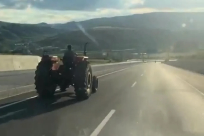 80 kilometre hızla giden aracı sollayan traktör sürücüsü kamerada
