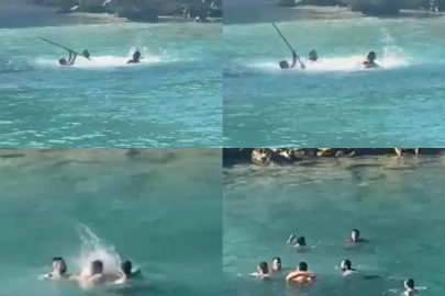 Mersin’de denizin ortasında sopalı kavga kamerada
