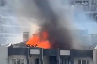 Küçükçekmece’de 11 katlı binanın çatısında çıkan yangında can pazarı yaşandı
