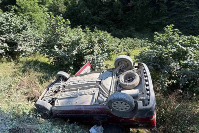 Takla atan otomobilden sağ çıktı
