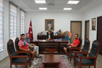 Köyceğiz Kaymakamı Kumcu, Dünya Şampiyonu Karahan’ı ağırladı
