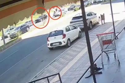 Motosikletiyle park halindeki otomobilin açılan kapısına çarpıp kamyonun altında kalan sürücü öldü