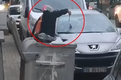 Tartıştığı kocasının otomobiline çekiçle zarar verdi
