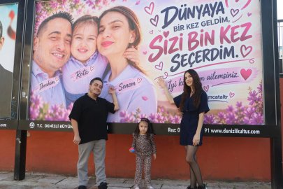 Eşine ve kızına sevgisini billboardlara taşıdı